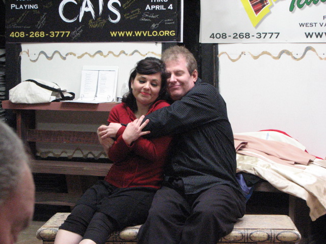 Charity (Katie O'Bryon) and Oscar (Michael Carey) share a moment on the ferris wheel.